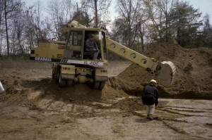 Gradall stripping plowzone in Area A.