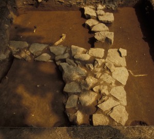 Cabin 4 foundation stones fully exposed, along with limestone extension.