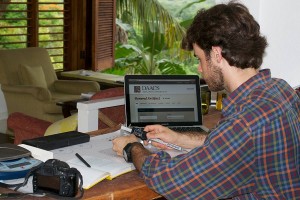 Hayden Bassett cataloging Good Hope Village artifacts into the DAACS database via the internet-based DAACS Research Consortium application.