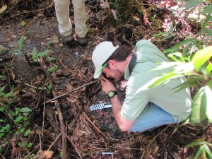 Hayden Bassett documenting surface artifacts.