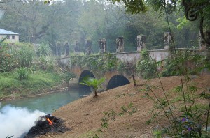 Ruins of the cane juice sluice from Good Hope Mill, crossing the Martha Brae river to the boiling house. Photographed by Jillian Galle, March 2006.