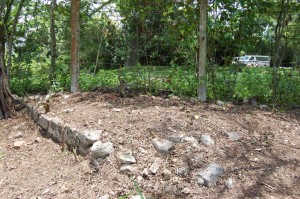 Foundation of a dependency related to the middle period Mona Great House, cleared in May 2011 during field school.