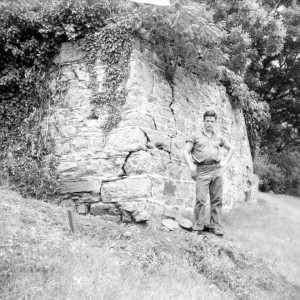 Exterior of the 1809 Stone House in 1957. Note the difference in stonework near ground level.