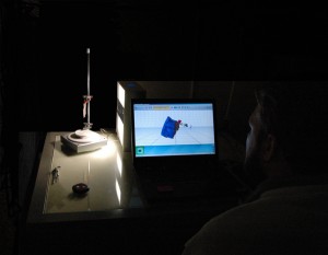 Jesse Sawyer, DAACS Analyst, scans an Afro-Caribbean ceramic sherd using a NextEngine 3D Laser Scanner.