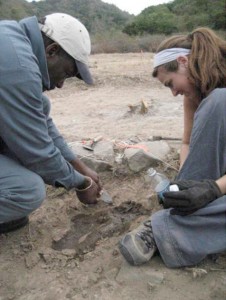 Silvester Silcott and Kate DesCoteaux excavate an emedded sherd of Afro-Caribbean ceramic from Area 1 at the Worker's Village.